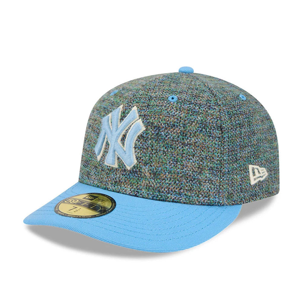 New York Yankees MLB Tweedy Cotton Pastel Blue New Era 59FIFTY Fitted Cap, three-quarter view showing the raised pastel blue NY logo embroidered on the front panel, a matching pastel blue visor, and a gold 59FIFTY size sticker.