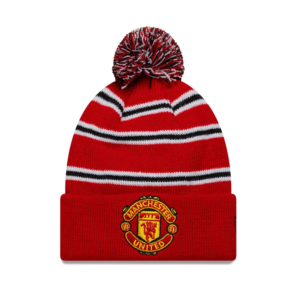 New Era Manchester United FC Infant Stripe Red Cuff knit Beanie Hat, front view showing the embroidered Manchester United crest on the red cuff, with red, black and white striped pattern on the crown and a matching red, black.