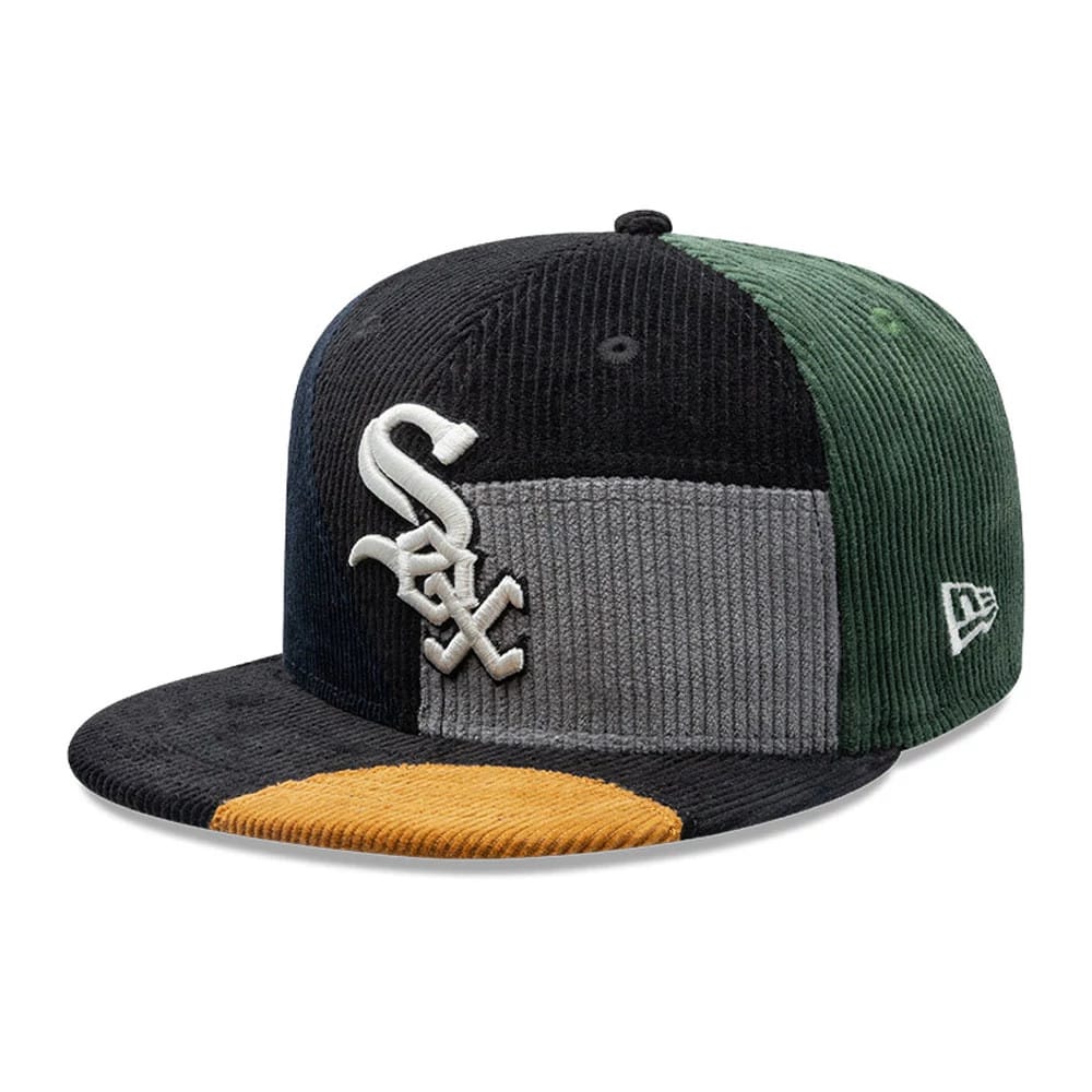 Chicago White Sox MLB Patchwork Black New Era 59FIFTY Fitted Cap, three-quarter view showing the raised white embroidered Sox logo on black, grey and green corduroy panels with a contrasting mustard and black visor.