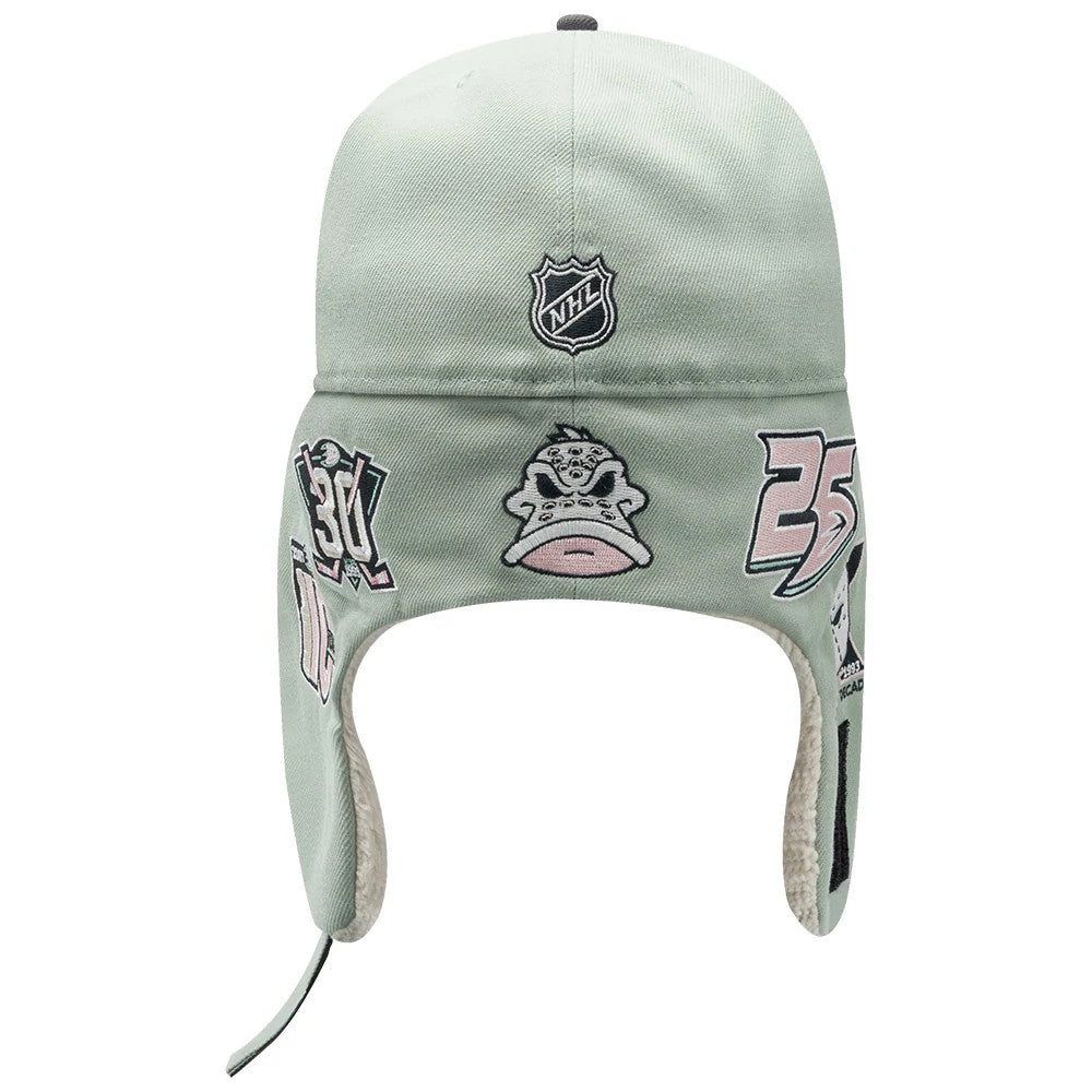 Anaheim Ducks NHL Patch Pastel Green New Era 59FIFTY Fitted Cap, front view showing the NHL shield logo embroidered at the centre, with various team patch designs in pastel colours on the earflaps, and a soft, plush lining.