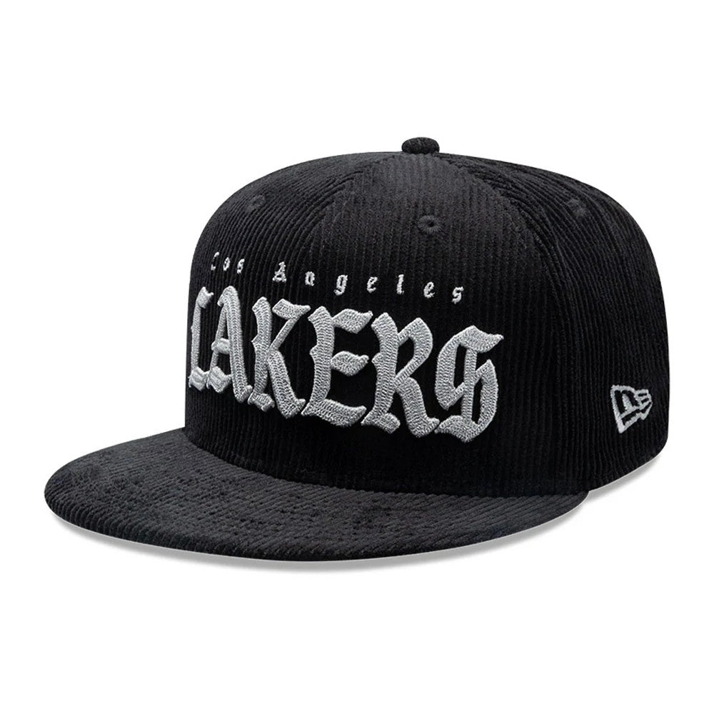 Pictured is this NBA Old English LA Lakers 9FIFTY Snapback cap in black. 1