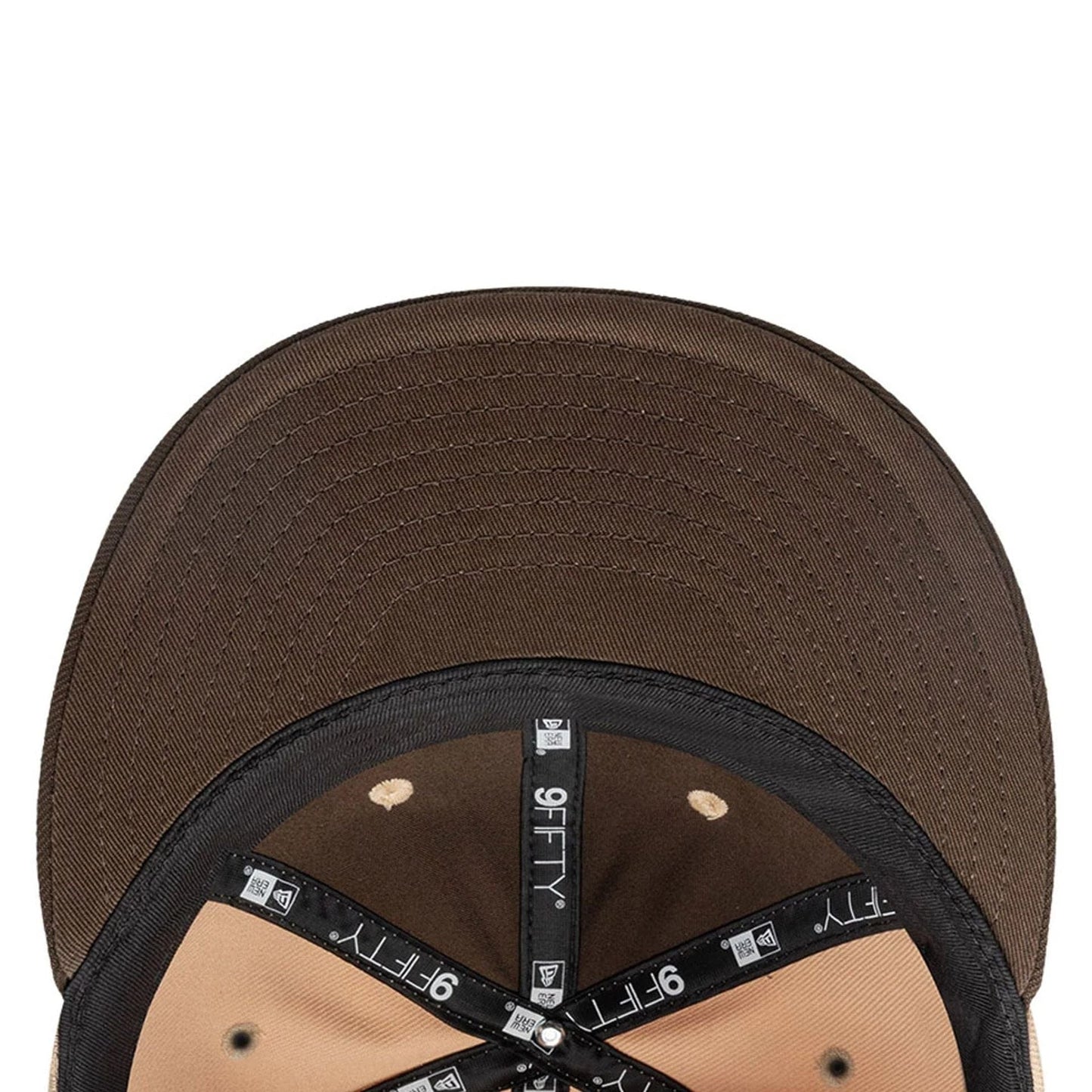 New York Yankees MLB Gothic Script Beige Retro Crown New Era 9FIFTY Cap, inside view showing a black undervisor, black 9FIFTY size sticker on the black taping, and beige panels with black embroidered eyelets and beige sweatband.