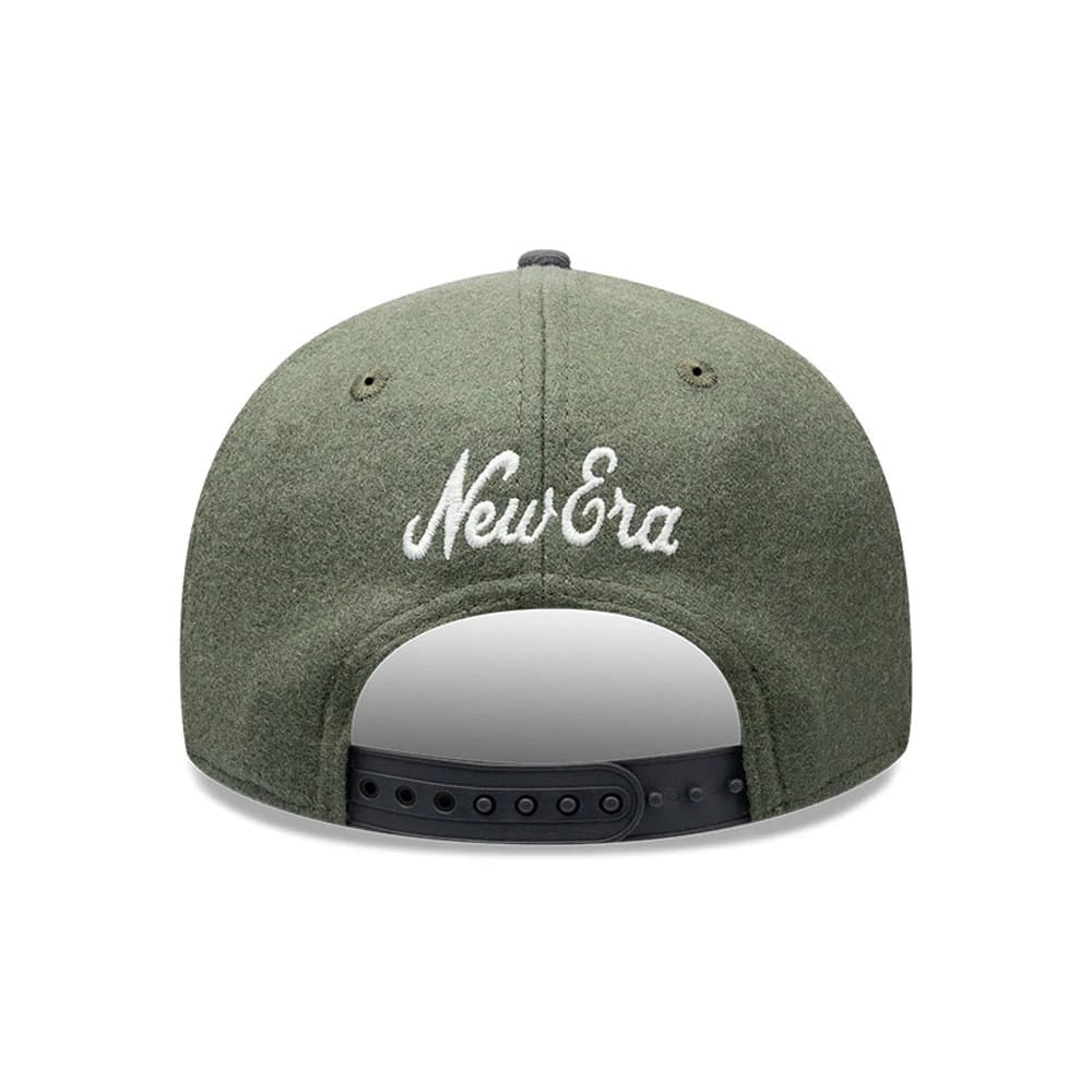 New Era Melton Wool Green Retro Crown 9FIFTY Cap, rear view showing the white embroidered New Era script logo across the back panels, with an adjustable black snapback closure and two black eyelets on the crown.