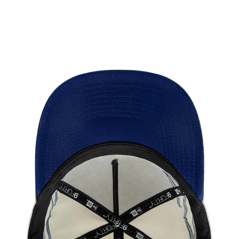 LA Dodgers MLB Flame Cream New Era 9FORTY A-Frame Cap, inside view showing the black sweatband, white inner panels, and black taping with white 9FORTY text, alongside a dark blue undervisor, highlighting the cap's detailed interior construction.
