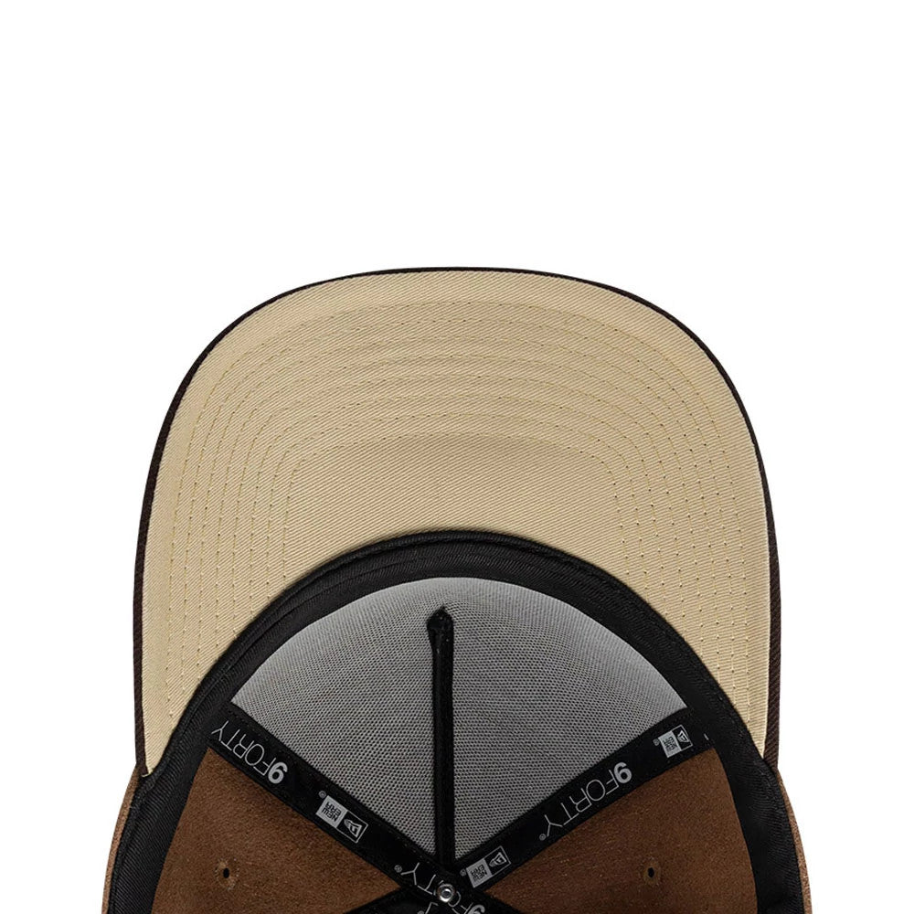 New Era Melton Wool Beige 9FORTY A-Frame Cap, inside view showing a beige undervisor with contrasting stitching, a black sweatband featuring the 9FORTY logo, and dark taping with the New Era logo on the structured panels.