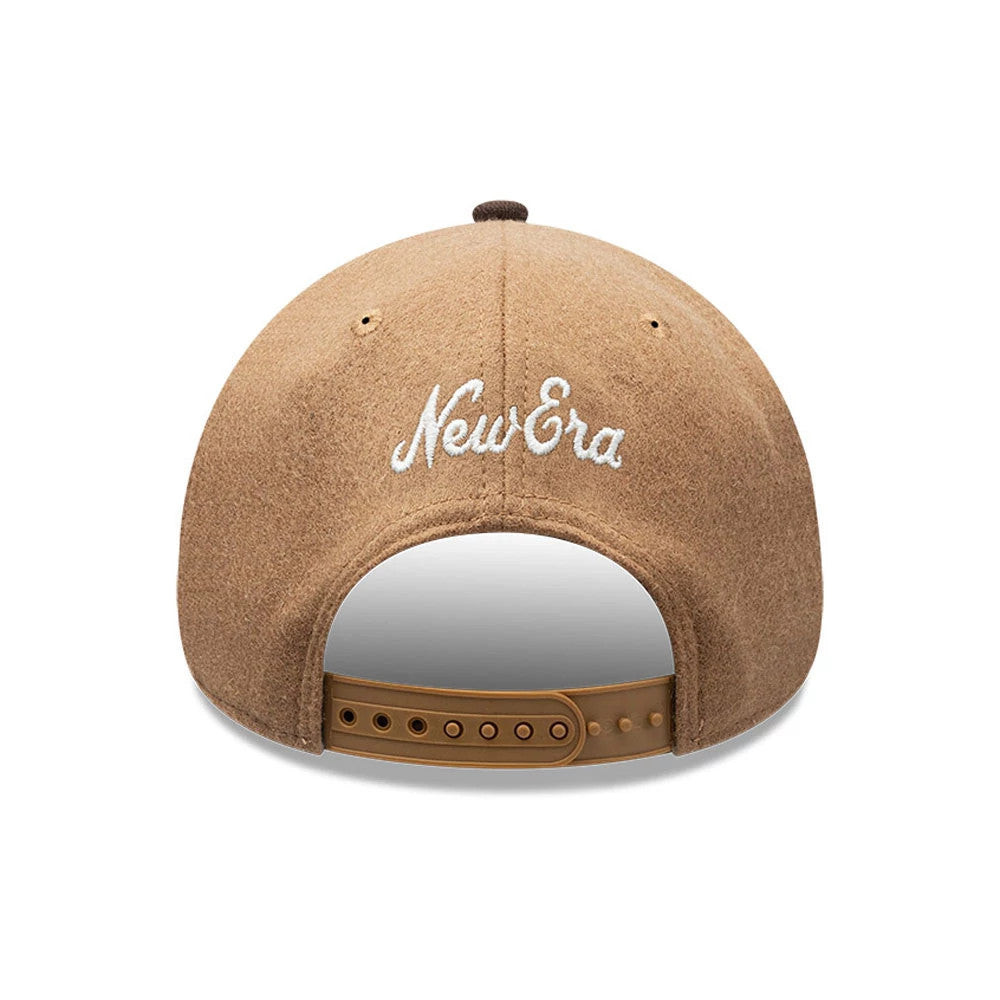 New Era Melton Wool Beige 9FORTY A-Frame Cap, rear view showing the white embroidered New Era logo at the centre of the back panels, highlighting the adjustable beige snapback closure and melton wool texture of the crown.