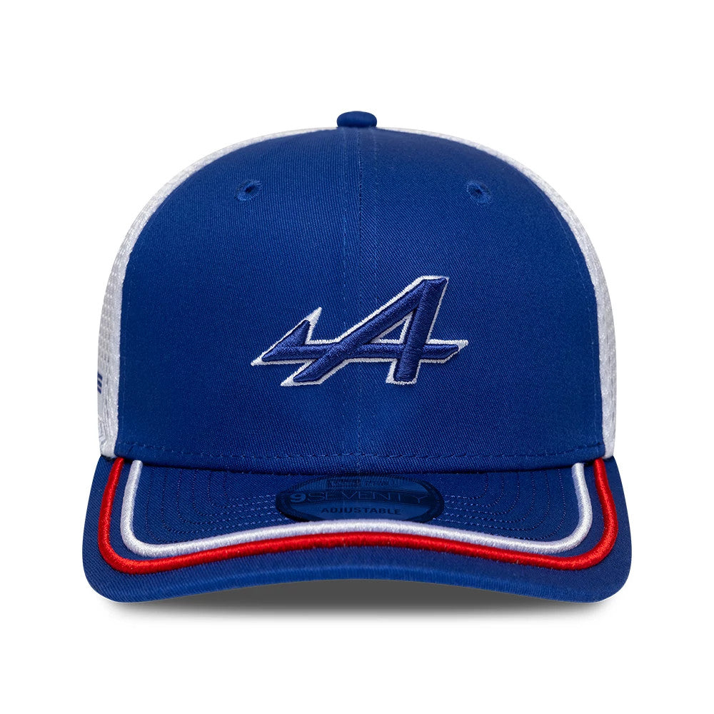 Alpine Racing WEC 2025 Blue New Era 9SEVENTY Stretch Snap Cap, front view showing the raised white and blue embroidered A logo on the blue front panel, a blue visor trimmed with red and white lines, and a 9SEVENTY size sticker.