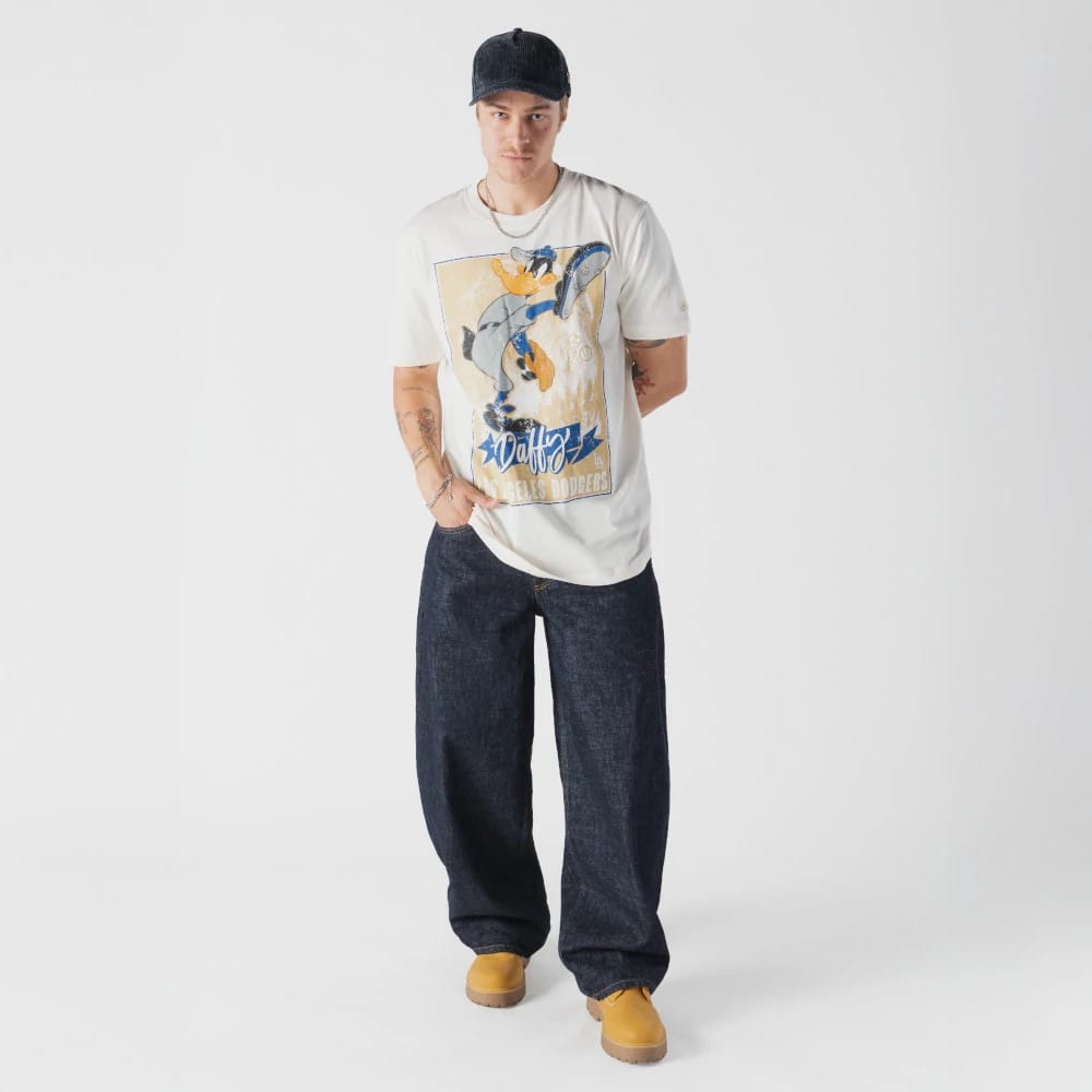 The model is wearing this MLB X Looney Tunes LA Dodgers T-Shirt in Cream. 5