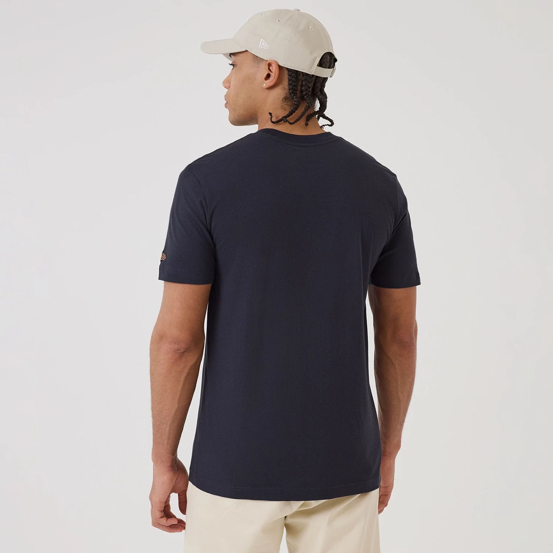 The model is wearing this MLB X Looney Tunes New York Yankees T-Shirt in navy. 2