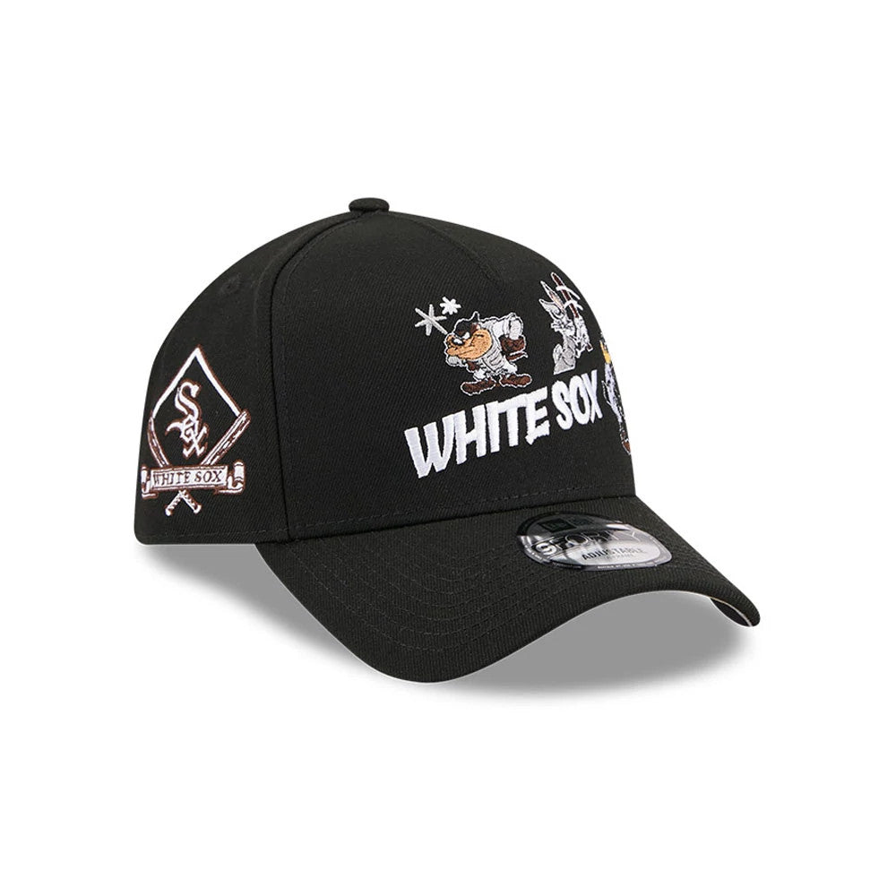 Chicago White Sox MLB X Looney Tunes Black New Era 9FORTY A-Frame Adjustable Cap, three-quarter view showing the white embroidered White Sox text and Looney Tunes characters on the front panel, with the Chicago White Sox logo patch on the left side.