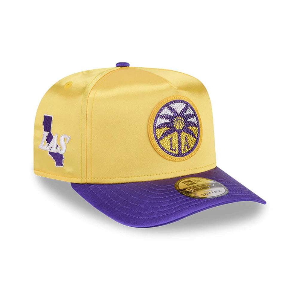 LA Sparks WNBA Draft 2026 Yellow New Era 9FIFTY A-Frame Snapback Adjustable Cap, three-quarter view showing the raised embroidered LA Sparks logo in purple and yellow on the front panel, purple visor with 9FIFTY size sticker, and LAS side logo.