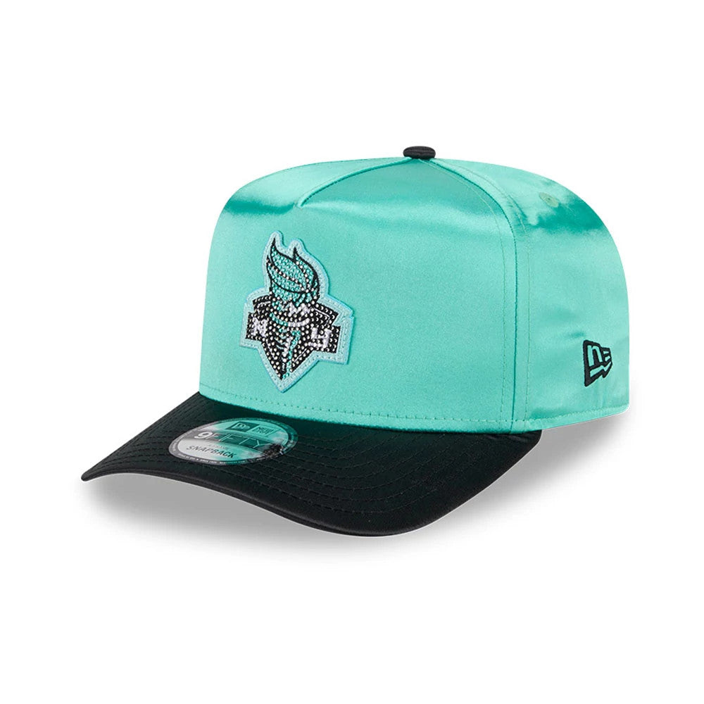 Liberty WNBA Draft 2026 Pastel Green New Era 9FIFTY A-Frame Snapback Adjustable Cap, front view showing the silver beaded logo on the front panel, a contrasting black curved visor with a 9FIFTY size sticker, and New Era flag logo on the left side.
