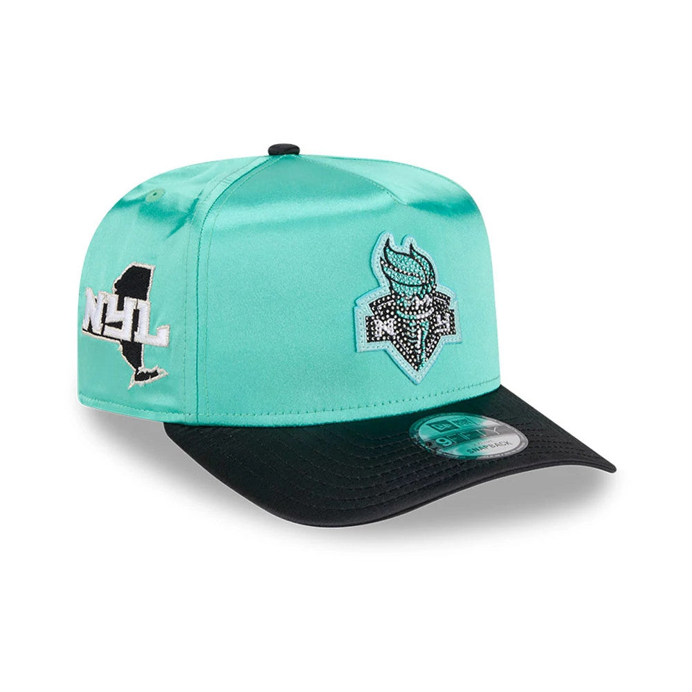 Liberty WNBA Draft 2026 Pastel Green New Era 9FIFTY A-Frame Snapback Adjustable Cap, three-quarter view with a rhinestone-embellished front panel logo, a white NYL patch on the left side, and a black flat visor with a 9FIFTY size sticker.