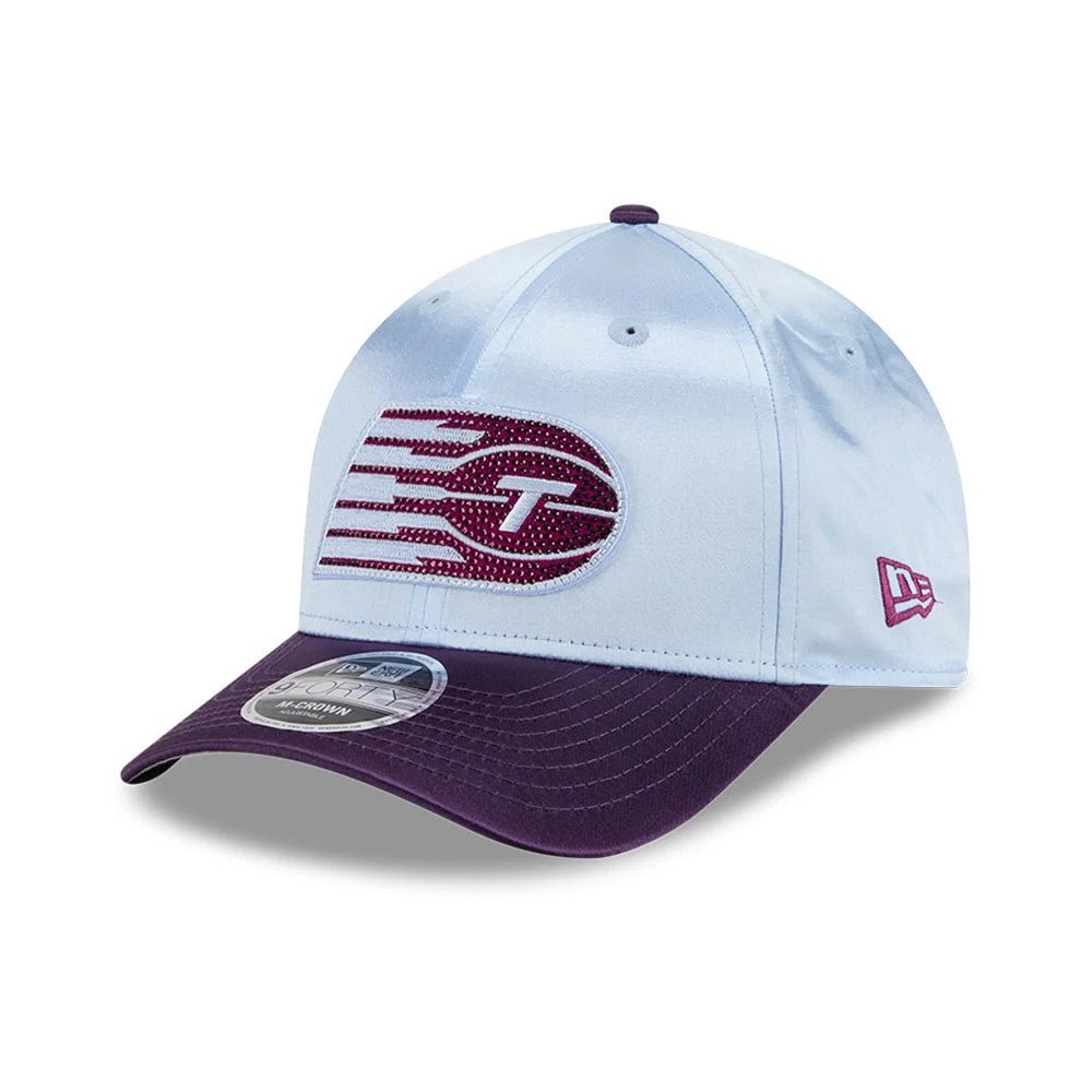 Toronto Tempo WNBA Draft 2026 Pastel Blue New Era 9FORTY M-Crown Adjustable Cap, three-quarter view showing a maroon and white embroidered logo on the front panel, a purple curved visor with a 9FORTY size sticker.