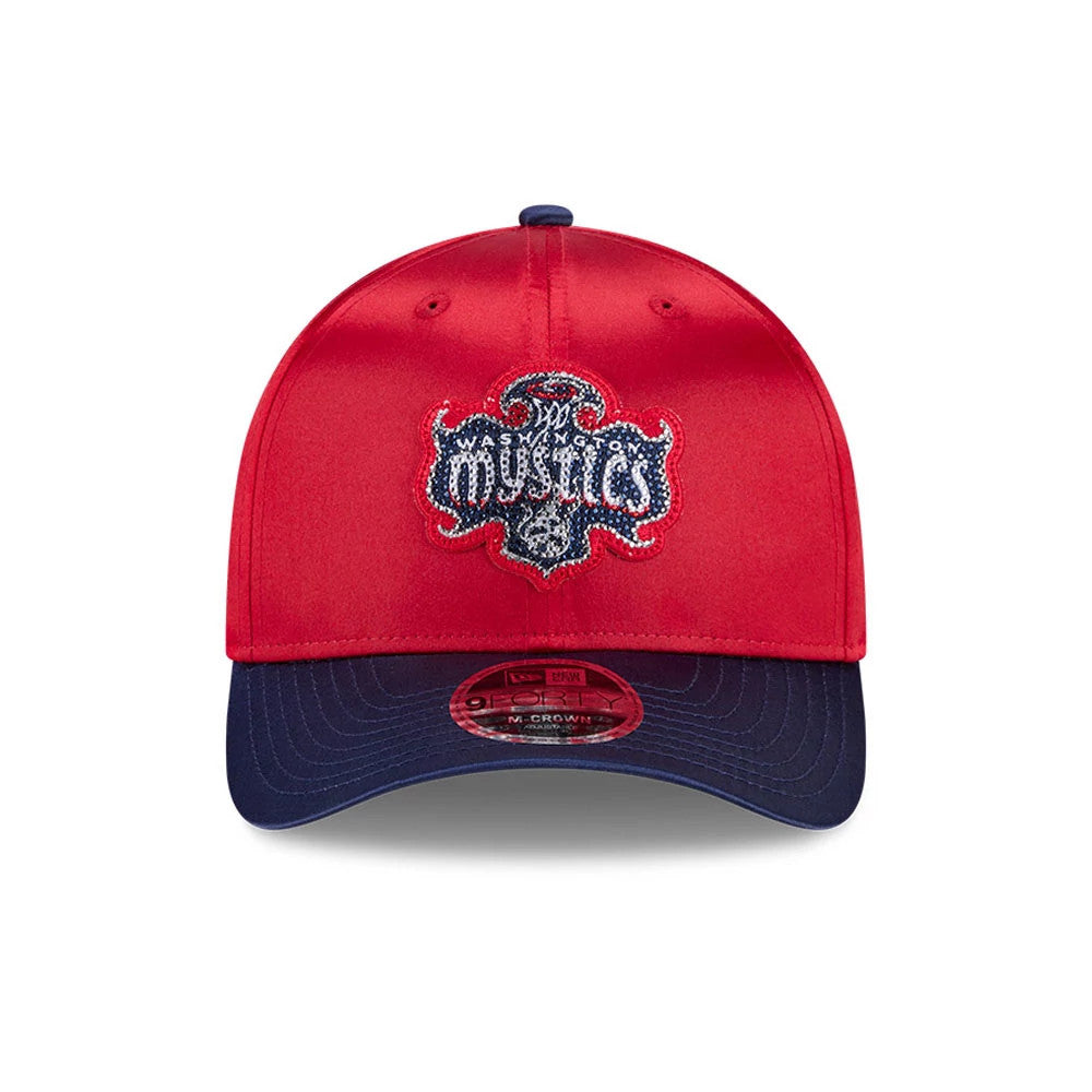 Washington Mystics WNBA Draft 2026 Red New Era 9FORTY M-Crown Adjustable Cap, front view showing the raised embroidered Mystics logo on the red front panels, contrasted by a dark blue curved visor with a 9FORTY size sticker.