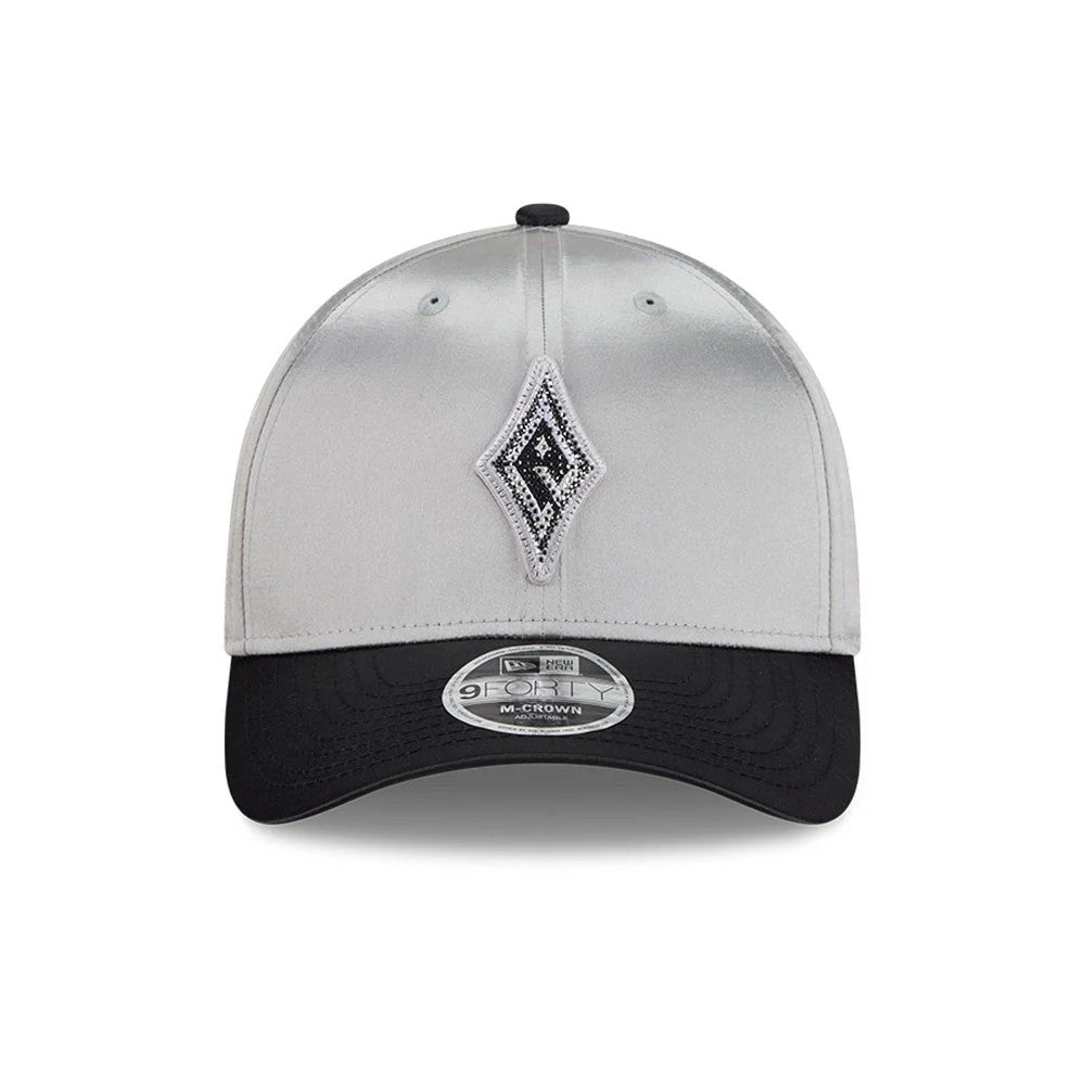 Las Vegas Aces WNBA Draft 2026 Silver New Era 9FORTY M-Crown Adjustable Cap, front view showing a raised diamond-shaped black and white logo embroidered on the silver front panels, black curved visor and 9FORTY size sticker on the visor.