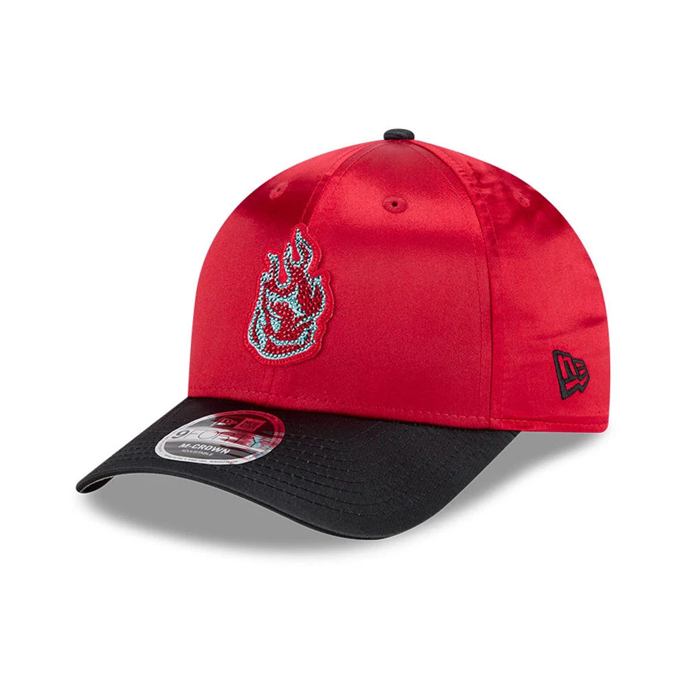 Portland Fire WNBA Draft 2026 Red New Era 9FORTY M-Crown Adjustable Cap, three-quarter view showing a raised blue embroidered flame logo on the front panel, a contrasting black curved visor with a 9FORTY size sticker.