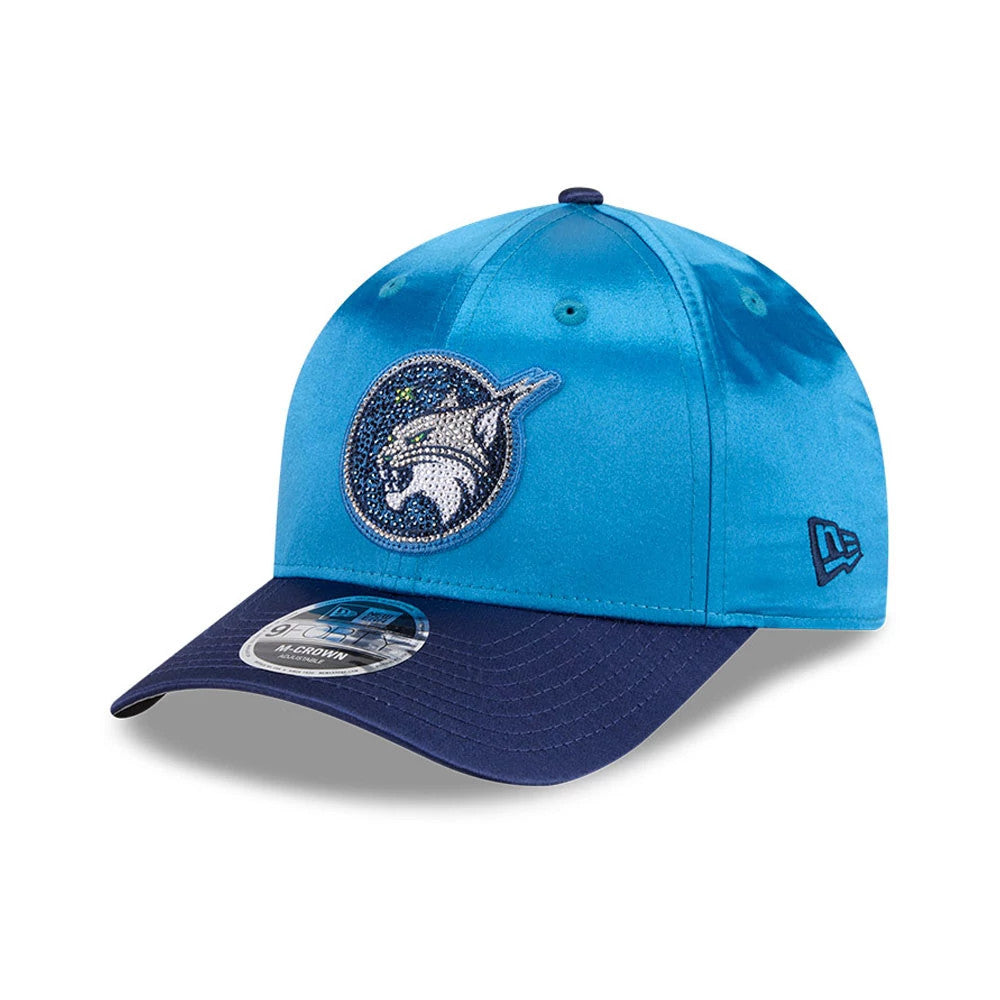 Minnesota Lynx WNBA Draft 2026 Blue New Era 9FORTY M-Crown Adjustable Cap, three-quarter view showing a raised embroidered Lynx logo on the front blue panel, dark blue curved visor with a 9FORTY size sticker, and New Era flag logo on the left side.