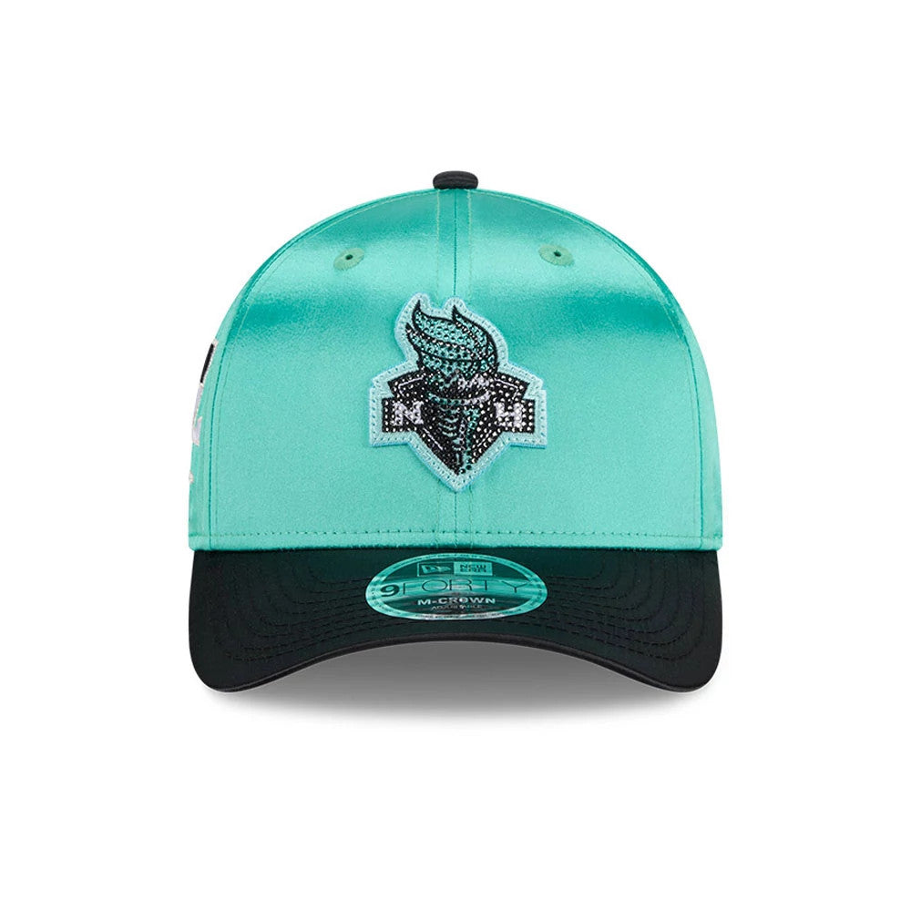 New York Liberty WNBA Draft 2026 Blue New Era 9FORTY M-Crown Adjustable Cap, front view showing a large black and white embroidered Liberty logo on the blue crown, with a black curved visor and a 9FORTY size sticker on the visor.