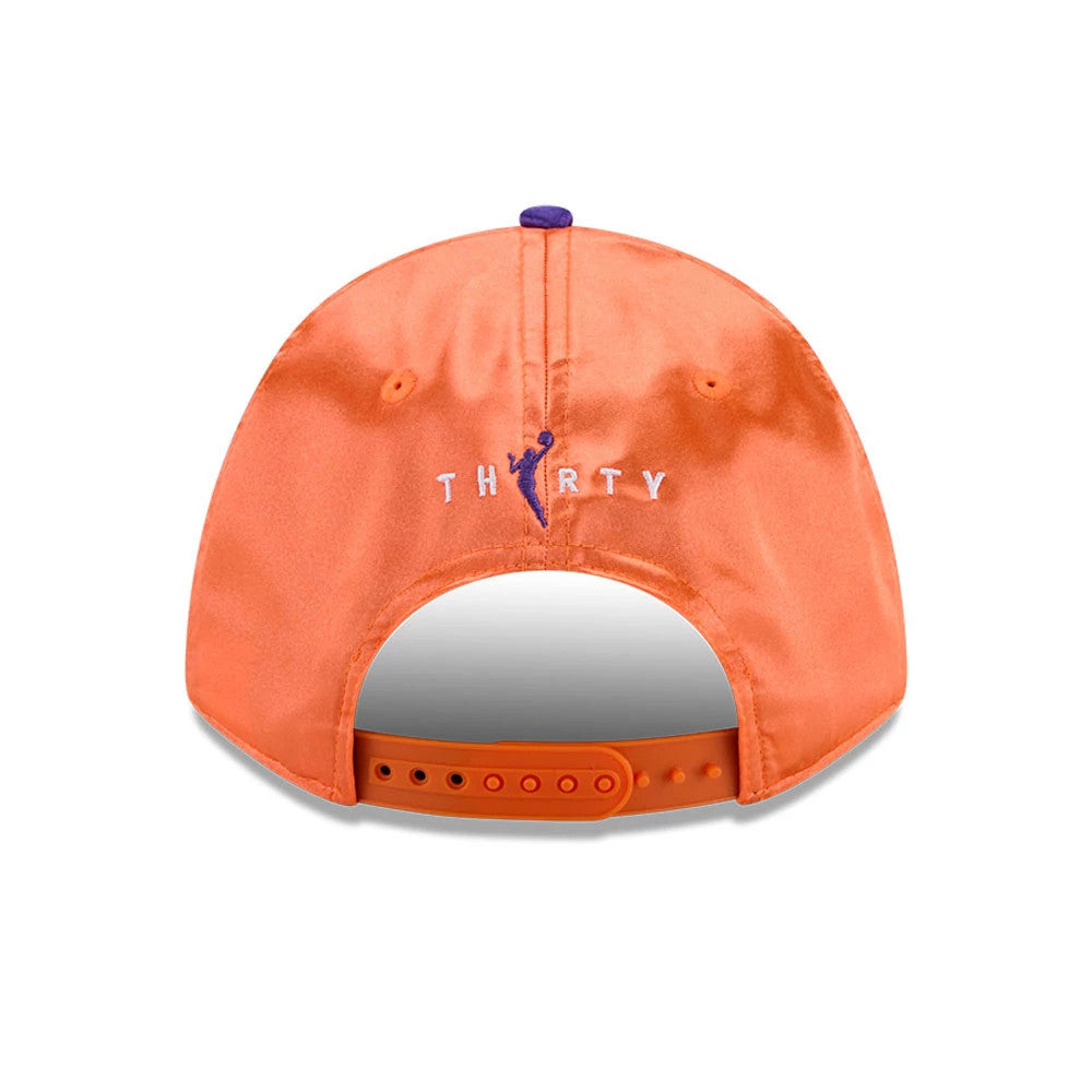 Phoenix Mercury WNBA Draft 2026 Orange New Era 9FORTY M-Crown Adjustable Cap, rear view showing the purple embroidered THIRTY logo at the centre of the orange back panels, adjustable strap with multiple holes, and eyelets.