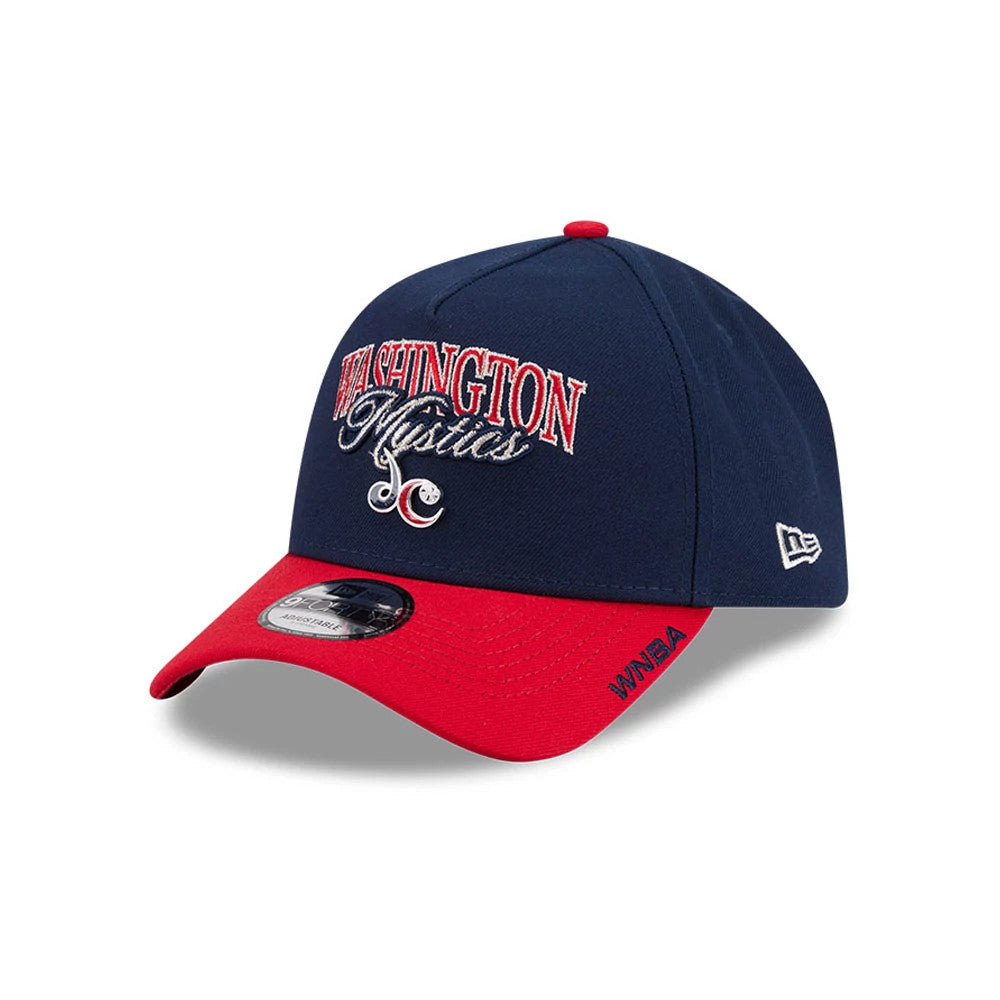Washington Mystics WNBA Tip Off 2026 Navy New Era 9FORTY A-Frame Adjustable Cap, three-quarter view showing the raised red and white embroidered team logo on the navy front panel, with a contrasting red curved visor featuring a 9FORTY size sticker.