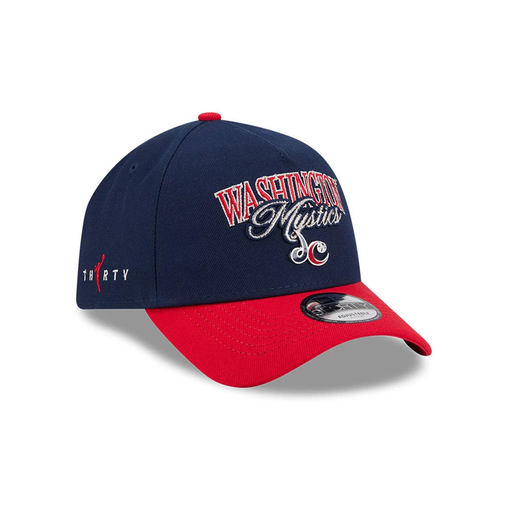 Washington Mystics WNBA Tip Off 2026 Navy New Era 9FORTY A-Frame Adjustable Cap, three-quarter view showing the red and white embroidered Mystics logo on the front panel, red curved visor with a 9FORTY size sticker.