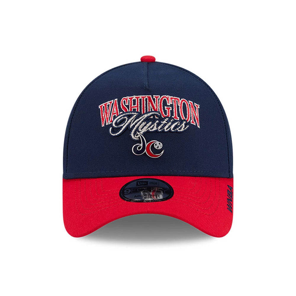 Washington Mystics WNBA Tip Off 2026 Navy New Era 9FORTY A-Frame Adjustable Cap, front view showing the raised red and white Washington Mystics embroidery on the navy crown, with a contrasting red curved visor and 9FORTY size sticker.