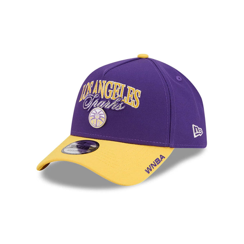 Pictured is this WNBA Tip Off 2026 LA Sparks 9FORTY A-Frame cap in purple. 1