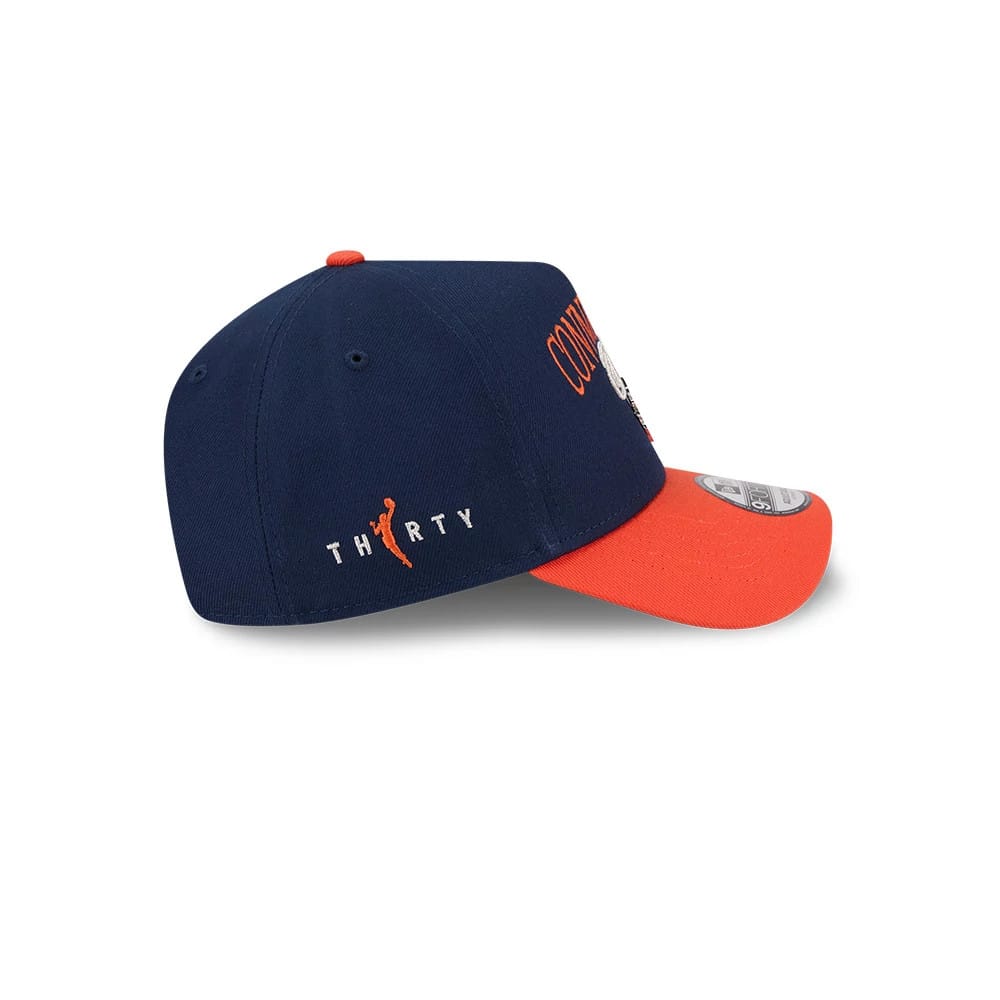 Connecticut Sun WNBA Tip Off 2026 Navy New Era 9FORTY A-Frame Adjustable Cap, side view showing the embroidered Thirty logo on the structured navy crown, curved orange visor with a 9FORTY size sticker, and matching orange top button.