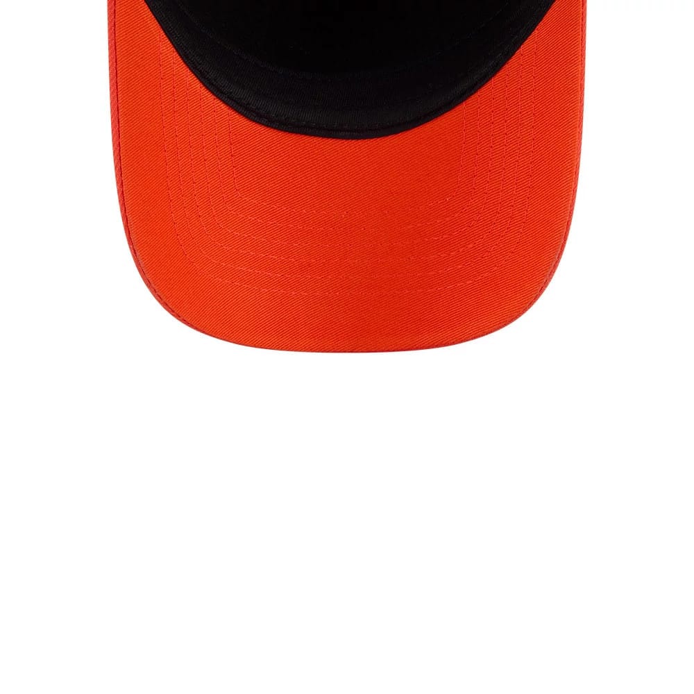 Connecticut Sun WNBA Tip Off 2026 Navy New Era 9FORTY A-Frame Adjustable Cap, inside view showing a contrasting orange visor with a black undervisor, highlighting the cap's stitching and structure.
