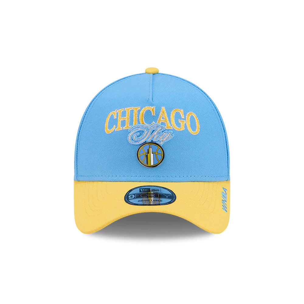 Chicago Sky WNBA Tip Off 2026 Light Blue New Era 9FORTY A-Frame Adjustable Cap, front view showing yellow embroidered Chicago Sky text with a yellow outlined basketball graphic, a light blue crown.