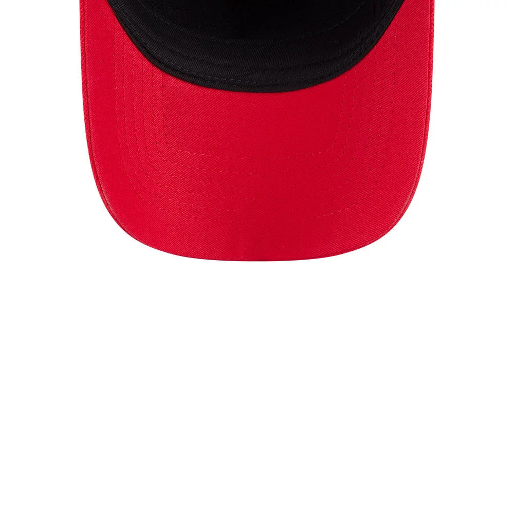 WNBA Portland Fire Tip Off 2026 Red New Era 9FORTY A-Frame Adjustable Cap, top view showing a vivid red curved visor with black on the underside, highlighting textured stitching across the panels.