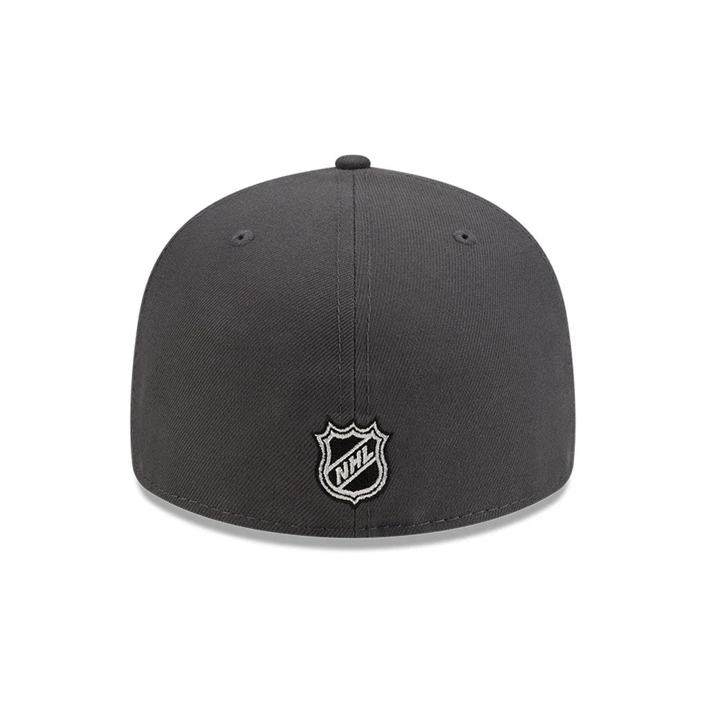 LA Kings NHL Stanley Cup Champions Dark Grey New Era 59FIFTY Fitted Cap, rear view showing the white embroidered NHL shield logo centred on the lower back panels, with a structured dark grey crown and a matching top button.