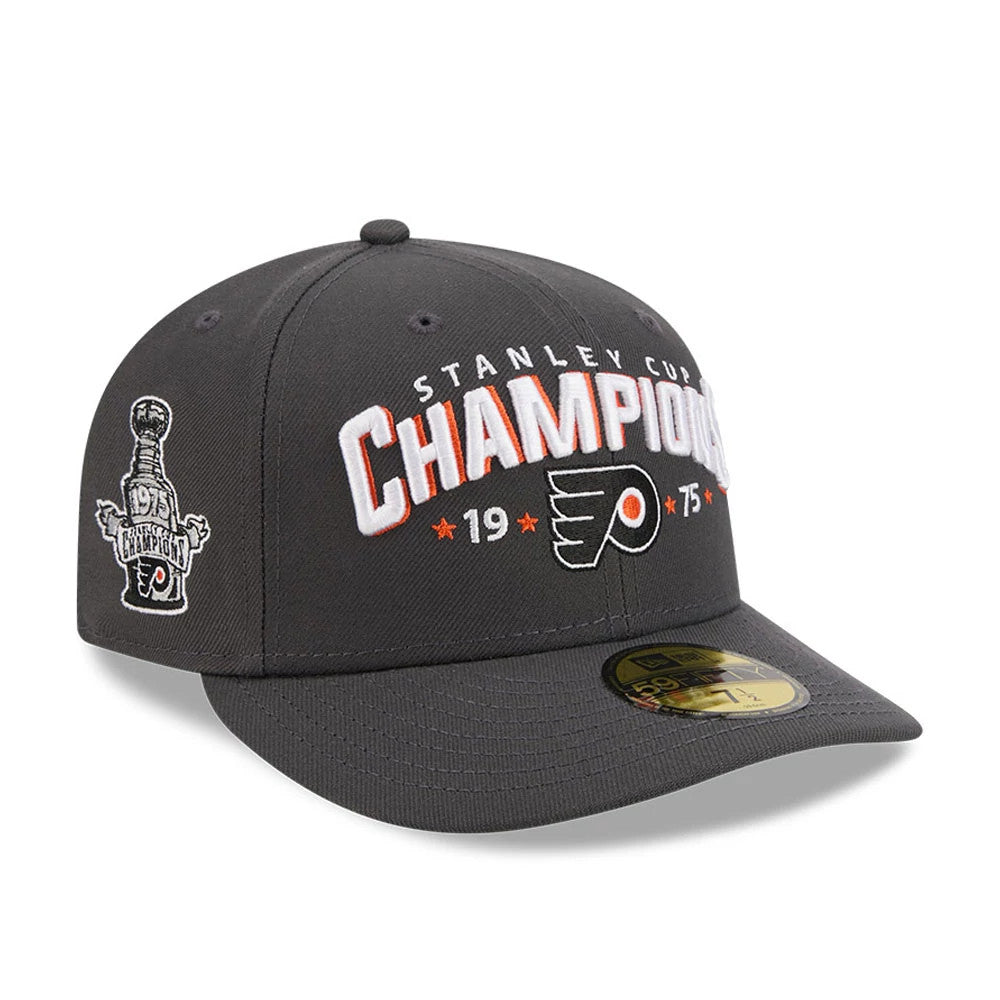 Philadelphia Flyers NHL Stanley Cup Champions Dark Grey New Era 59FIFTY Fitted Cap, three-quarter view showing raised white and orange Champions embroidery on the front panel, cup graphic on the right side.