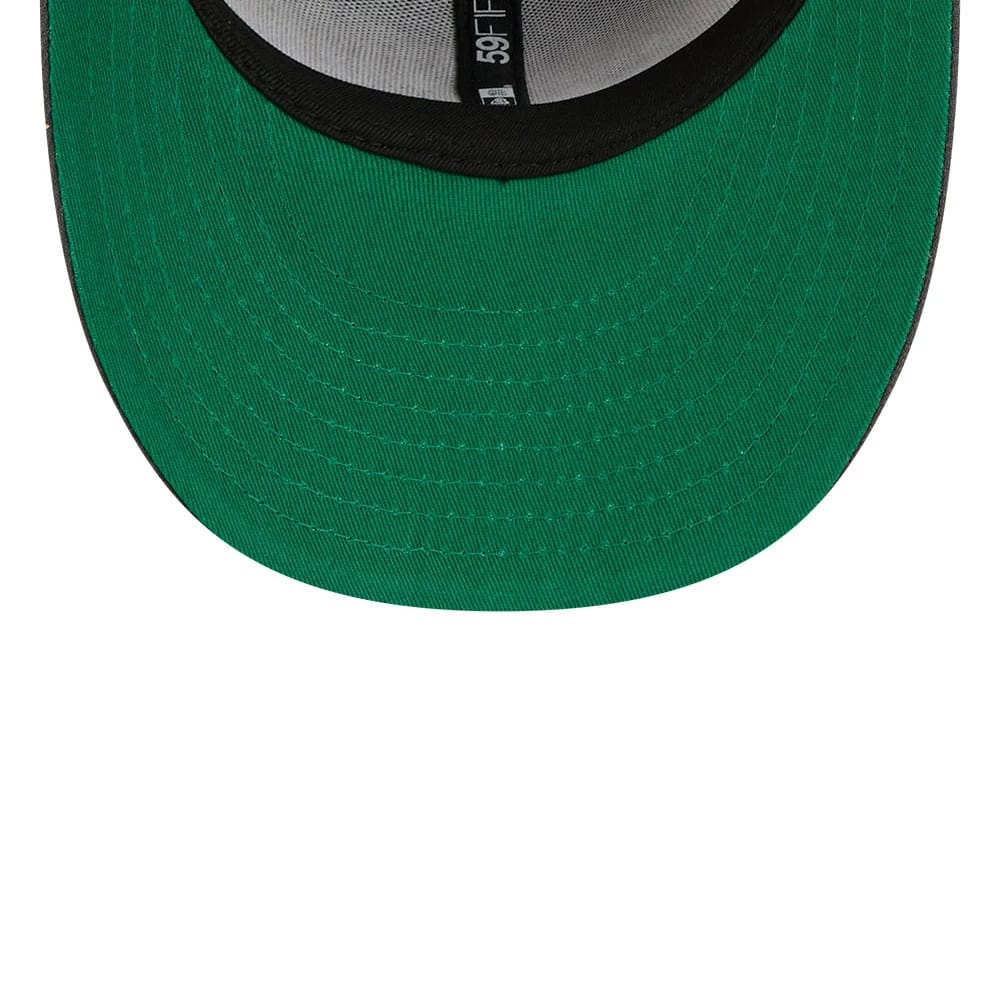 Philadelphia Flyers NHL Stanley Cup Champions Dark Grey New Era 59FIFTY Fitted Cap, inside view showing a bright green undervisor paired with a black sweatband, and grey panel lining with 59FIFTY branding on a black fabric strip.