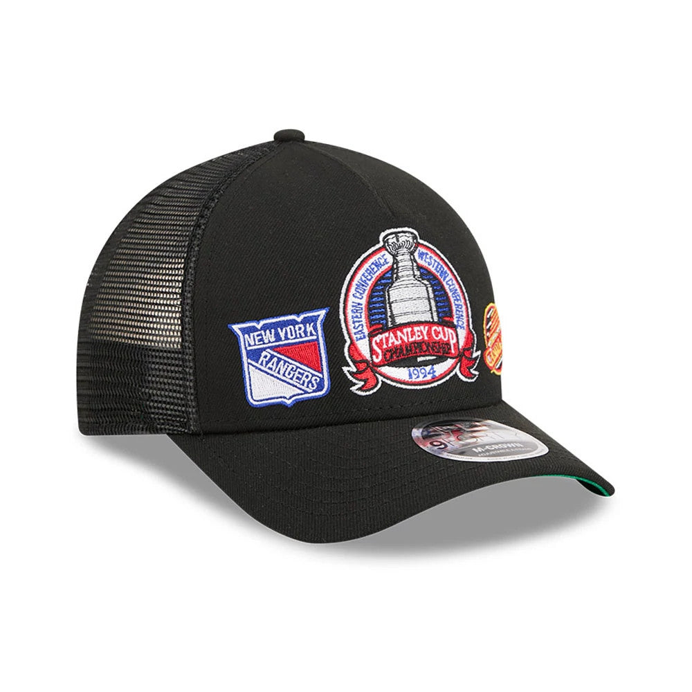 Rangers NHL Stanley Cup Black New Era 9FORTY M-Crown A-Frame Trucker Adjustable Cap, front view showing embroidered Stanley Cup and New York Rangers logos on the front panels, a curved black visor, and 9FORTY size sticker on the top.