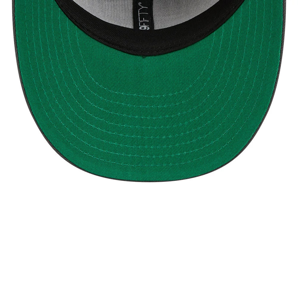 Toronto Maple Leafs NHL Stanley Cup Champions Dark Grey New Era 59FIFTY Fitted Cap, inside view showing black taping with grey sweatband, green undervisor, and a 59FIFTY size sticker on the cap material lining the flat visor.