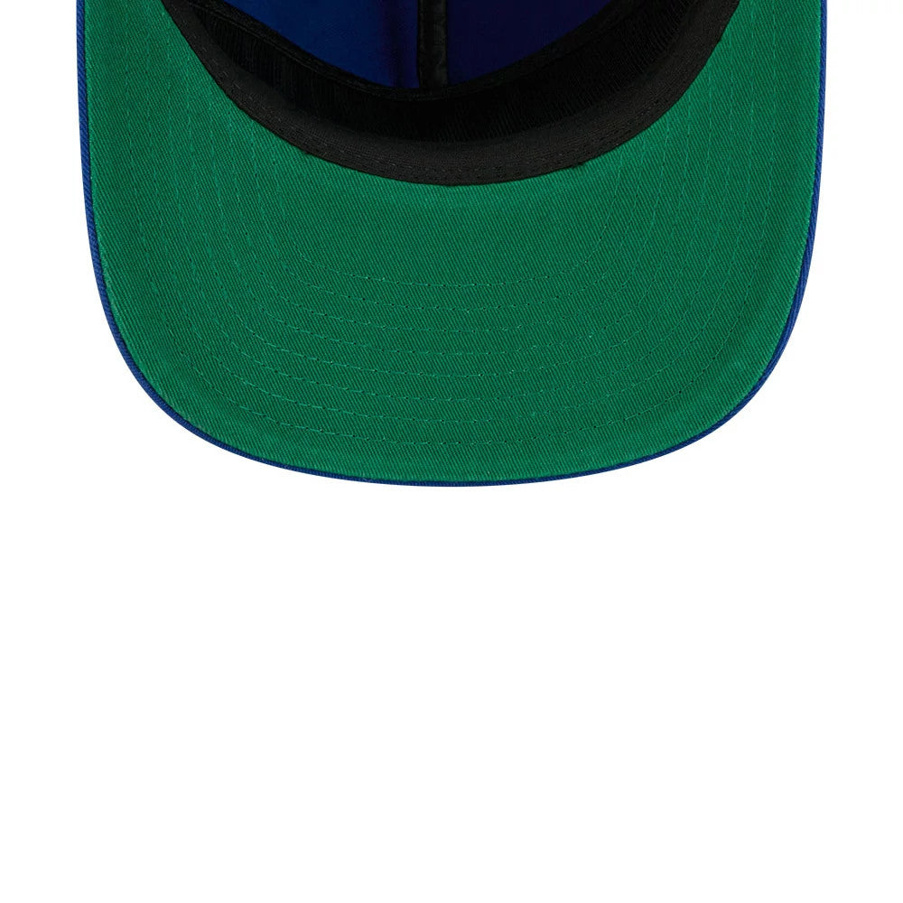 New York Islanders NHL Stanley Cup Champions Blue New Era 19TWENTY Adjustable Cap, inside view showing a green undervisor, black internal sweatband, and blue taping along the seams of the inner panels.