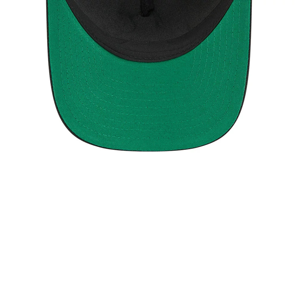 Kings NHL Stanley Cup Black New Era 9FORTY M-Crown A-Frame Trucker Adjustable Cap, inside view showing a vivid green undervisor, black inner sweatband, and matching black taping across the interior of the structured crown.