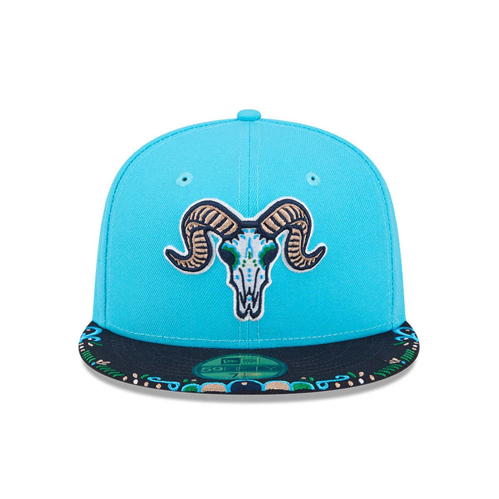 Yard Goats MiLB La Copa 2026 Bright Blue New Era 59FIFTY Fitted Cap, front view showing a raised embroidered ram skull logo on the structured bright blue crown, with a patterned flat visor featuring the New Era 59FIFTY size sticker.