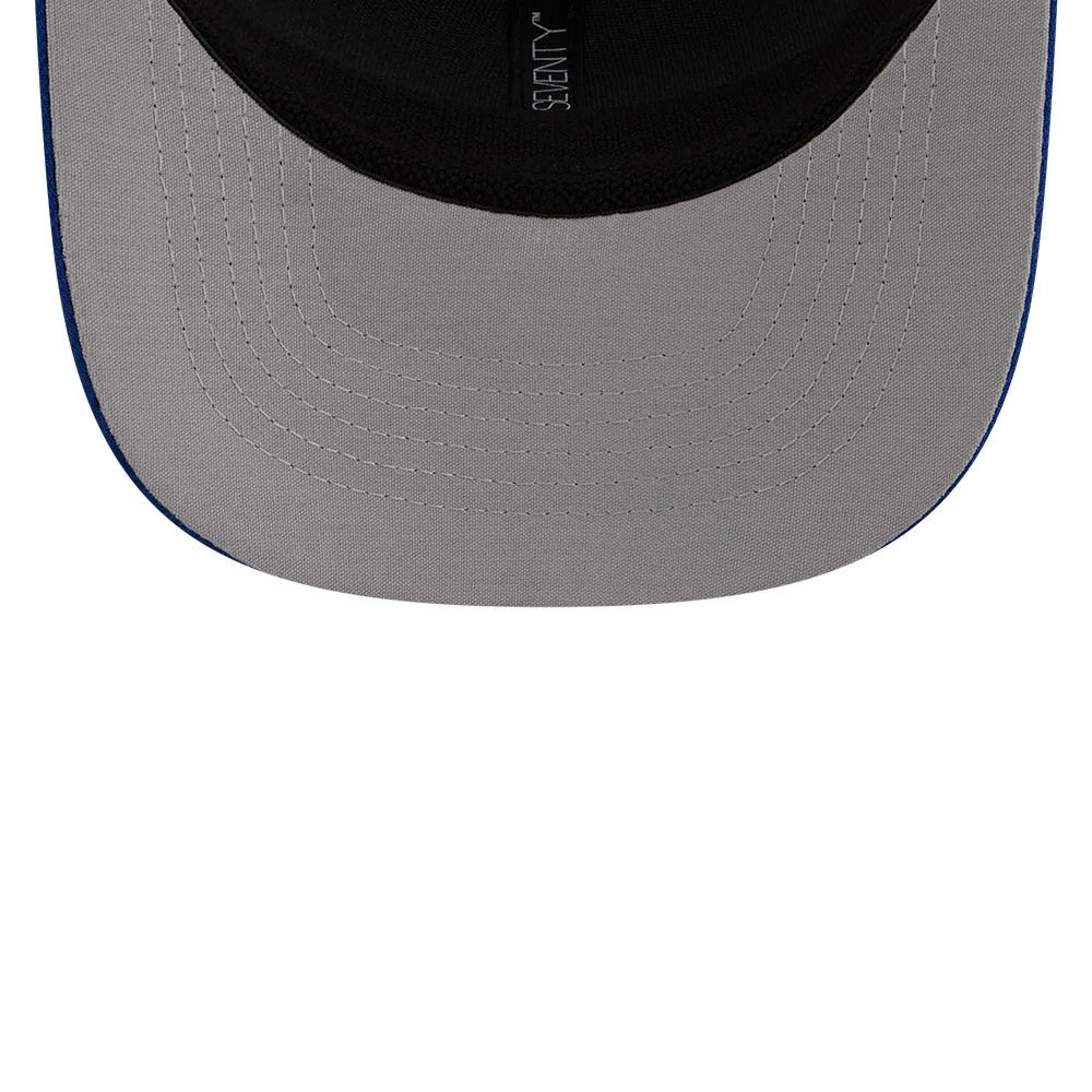 Hillsboro Hops MiLB La Copa 2026 Blue New Era 9SEVENTY Stretch Snap Adjustable Cap, inside view showing the contrasting grey undervisor, black sweatband, and diagonal taping with stitching, adding a unique touch to the cap’s design.