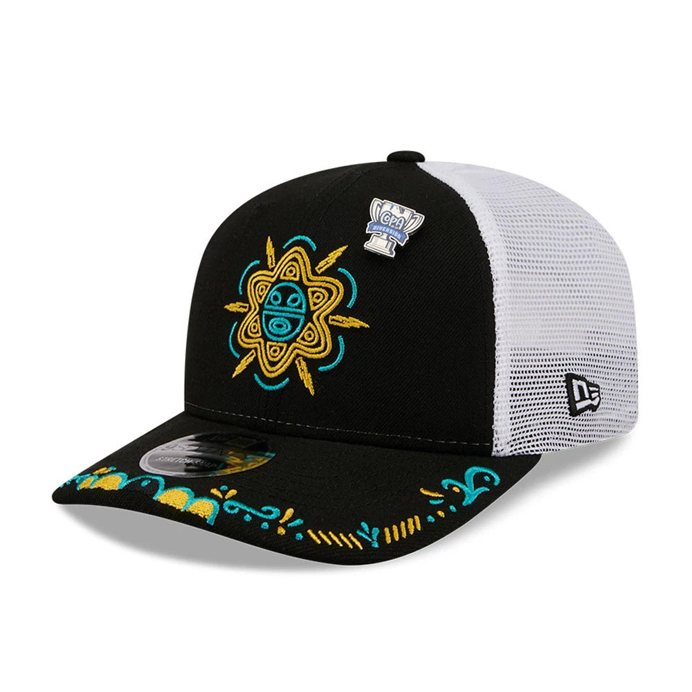 Buffalo Bisons MiLB La Copa 2026 Black New Era 9SEVENTY Stretch Snap Adjustable Cap, three-quarter view showing a colourful embroidered sun graphic on the front panel, a silver pin, and detailed yellow and turquoise patterns on the black visor.