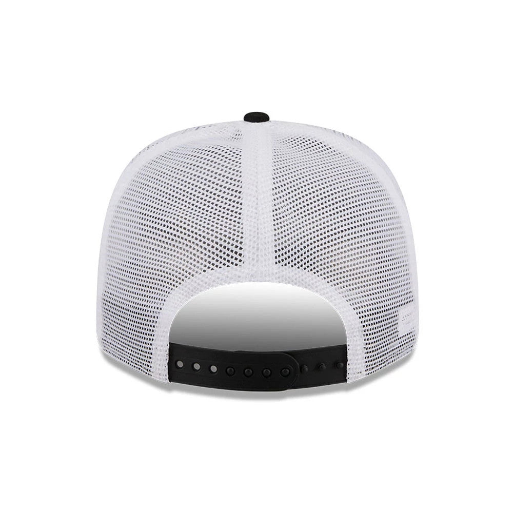 Buffalo Bisons MiLB La Copa 2026 Black New Era 9SEVENTY Stretch Snap Adjustable Cap, rear view showing the open-hole white mesh back panels, a central black snap closure at the base, and a black top button on the crown.