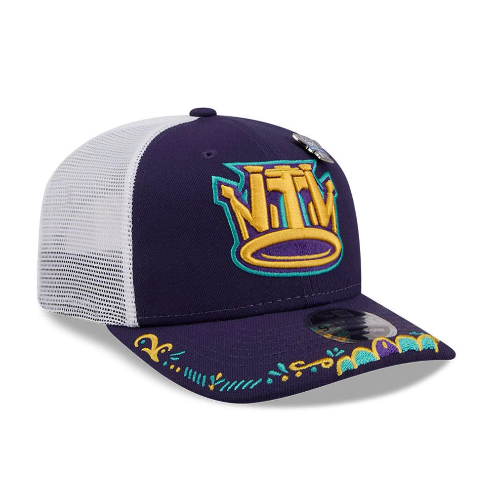 Cyclones MiLB La Copa 2026 Purple New Era 9SEVENTY Stretch Snap Adjustable Cap, three-quarter view showing an embroidered gold NTM logo with turquoise outlines on the front panel, decorative embroidery on the visor, and a 9SEVENTY size sticker.