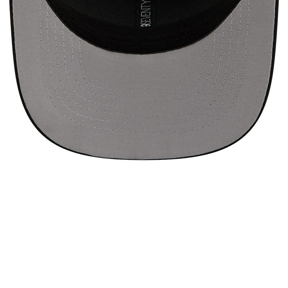 SLC Bee MiLB La Copa 2026 Black New Era 9SEVENTY Stretch Snap Adjustable Cap, close-up inside view showing the grey undervisor, black sweatband and 9SEVENTY taping, highlighting the neat stitch on the curved visor.
