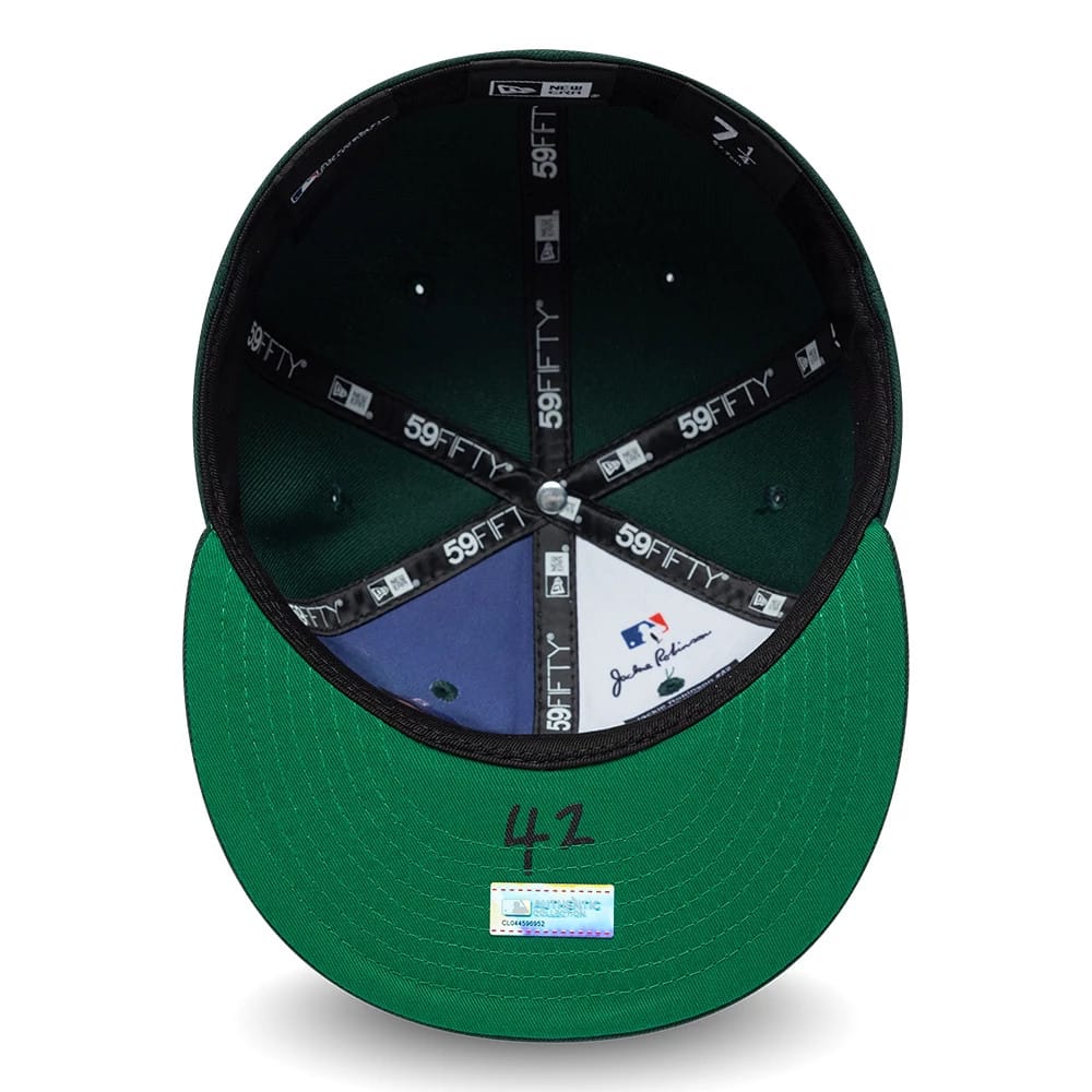 Athletics MLB Jackie Robinson Dark Green New Era 59FIFTY Fitted Cap, inside view showing black 59FIFTY taping, MLB logo, green undervisor with 42 in black, and a size label above the sweatband.