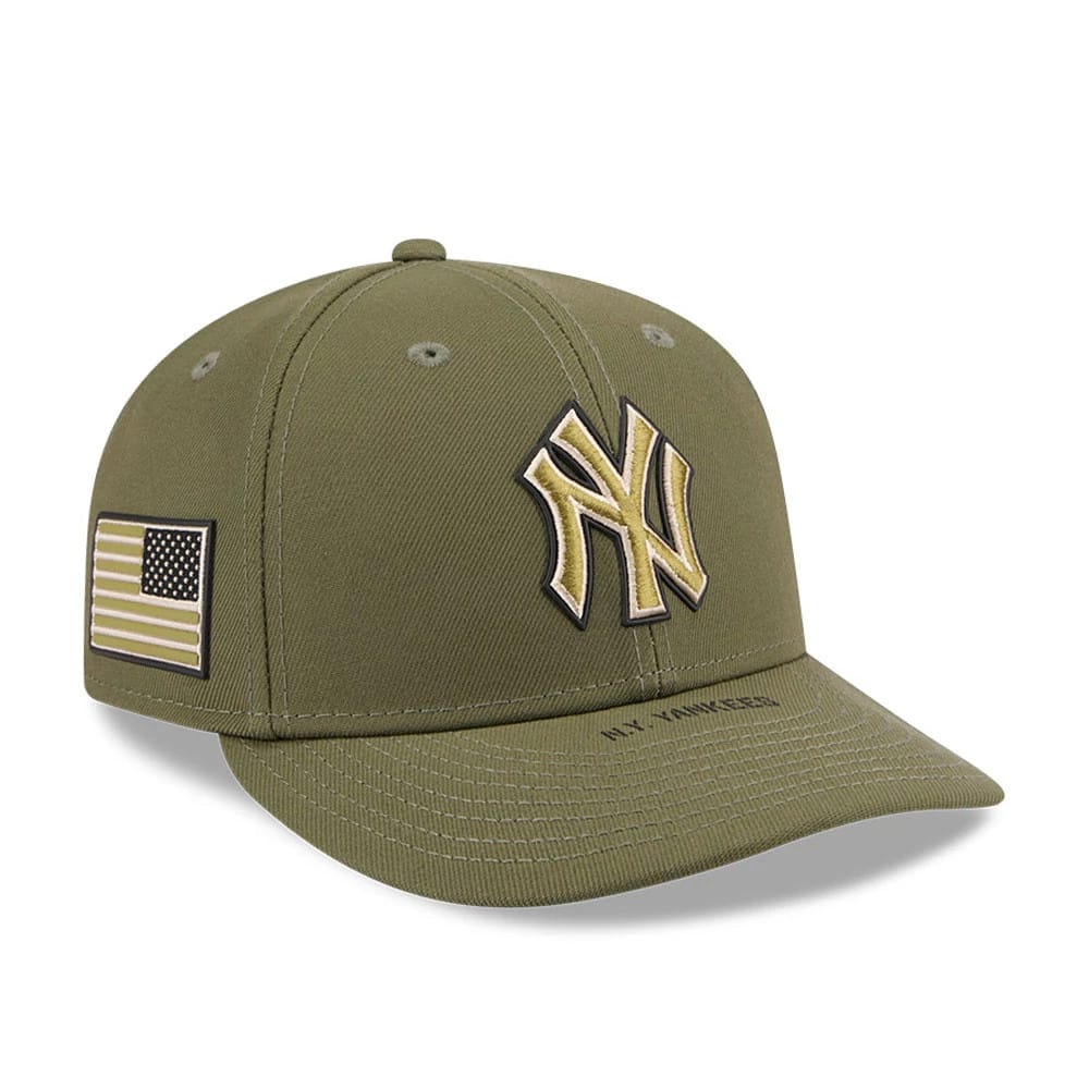 Yankees MLB Armed Forces Day 2026 Green Low Profile New Era 59FIFTY Fitted Cap, three-quarter view showing a raised gold NY logo on the front panel, with embroidered American flag patch on the left side and a curved green visor.