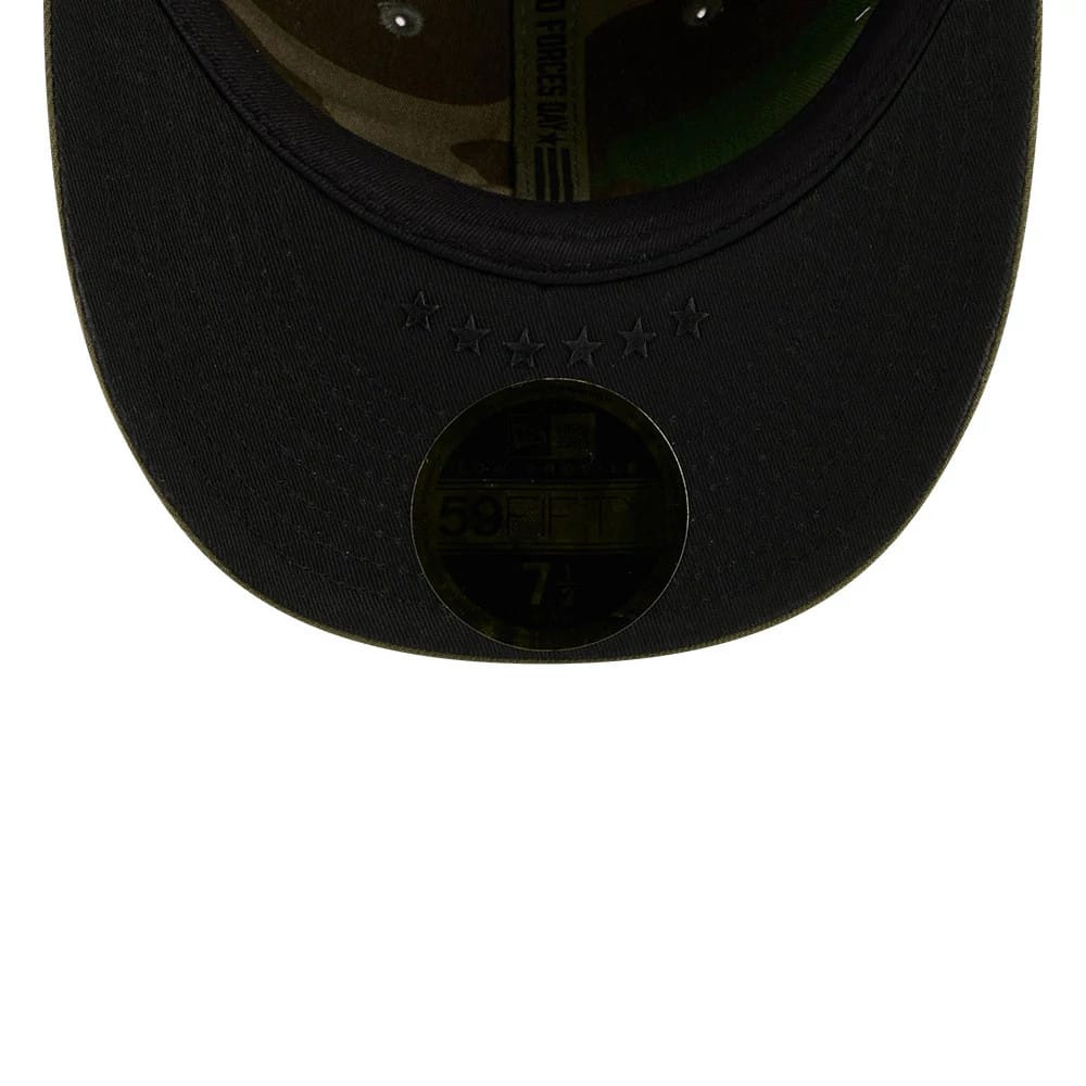 Yankees MLB Armed Forces Day 2026 Green Low Profile New Era 59FIFTY Fitted Cap, inside view showing a woodland camo printed undervisor, a gold 59FIFTY size sticker on the black visor, and the sweatband with military-themed text.