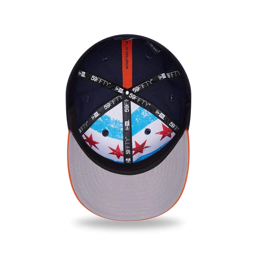 Chicago Bears NFL Draft 2026 Navy New Era 59FIFTY Fitted Cap, inside view showing the 59FIFTY branded taping, a grey undervisor, and a blue panel with red star designs on the interior, alongside a black sweatband.