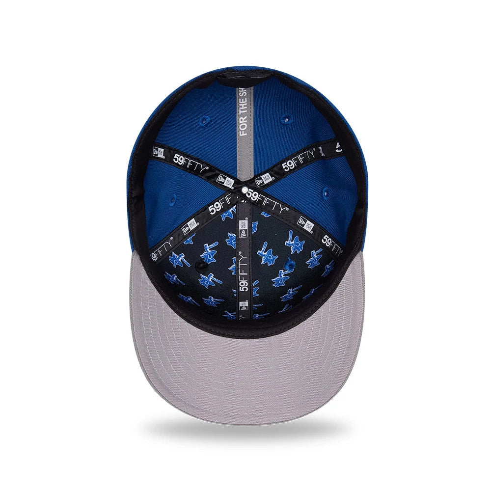Indianapolis Colts NFL Draft 2026 Blue New Era 59FIFTY Fitted Cap, inside view showing a black undervisor with Colts graphics, grey taping with repeated 59FIFTY logos, and a blue sweatband lining the crown.